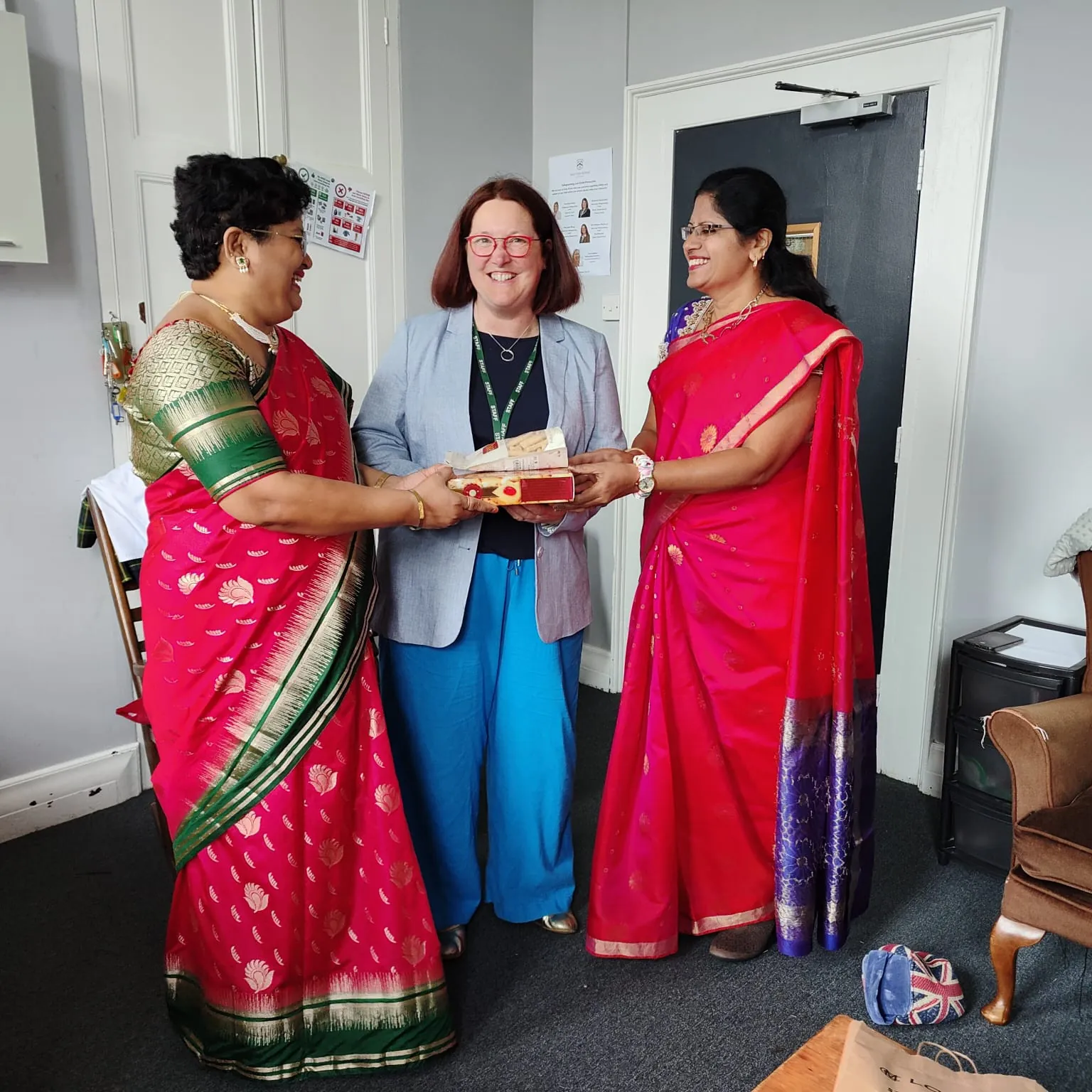 Indian educators meeting a UK school leader during an international school exchange