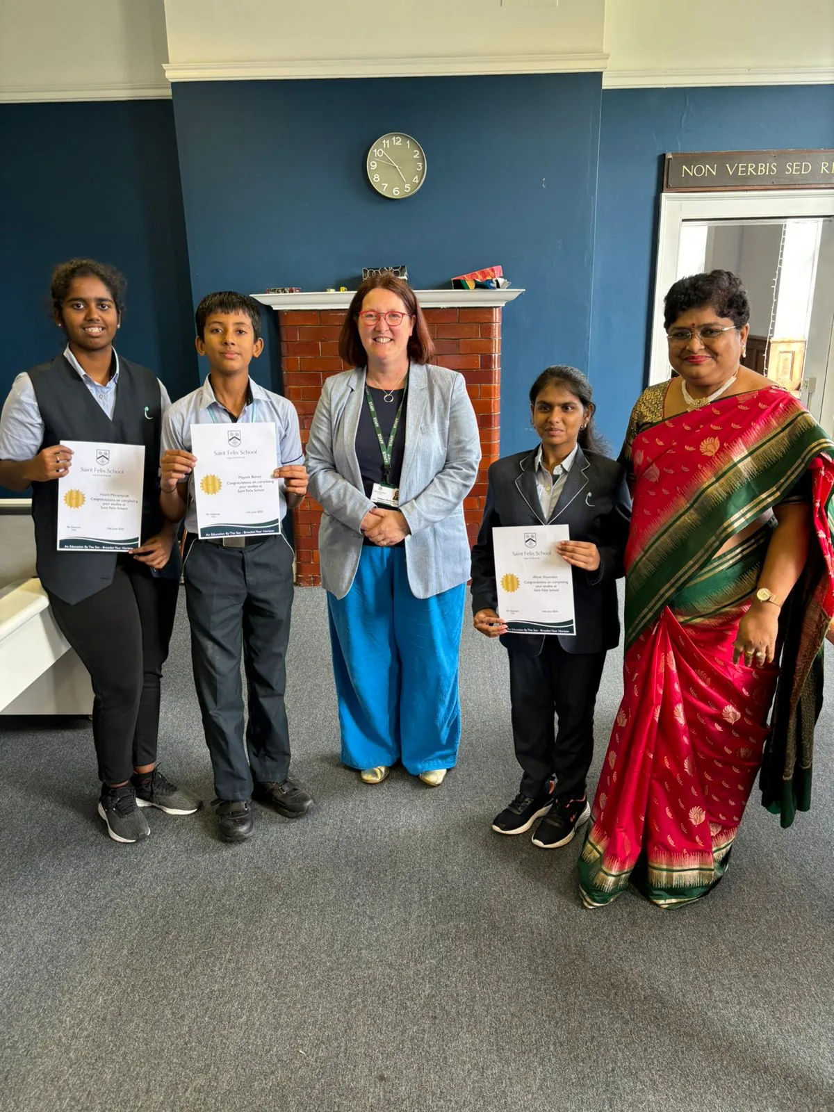 Students receiving programme certificates at Saint Felix School